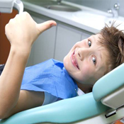 Smiling boy from Tulsa during his trip to the kids dentist.